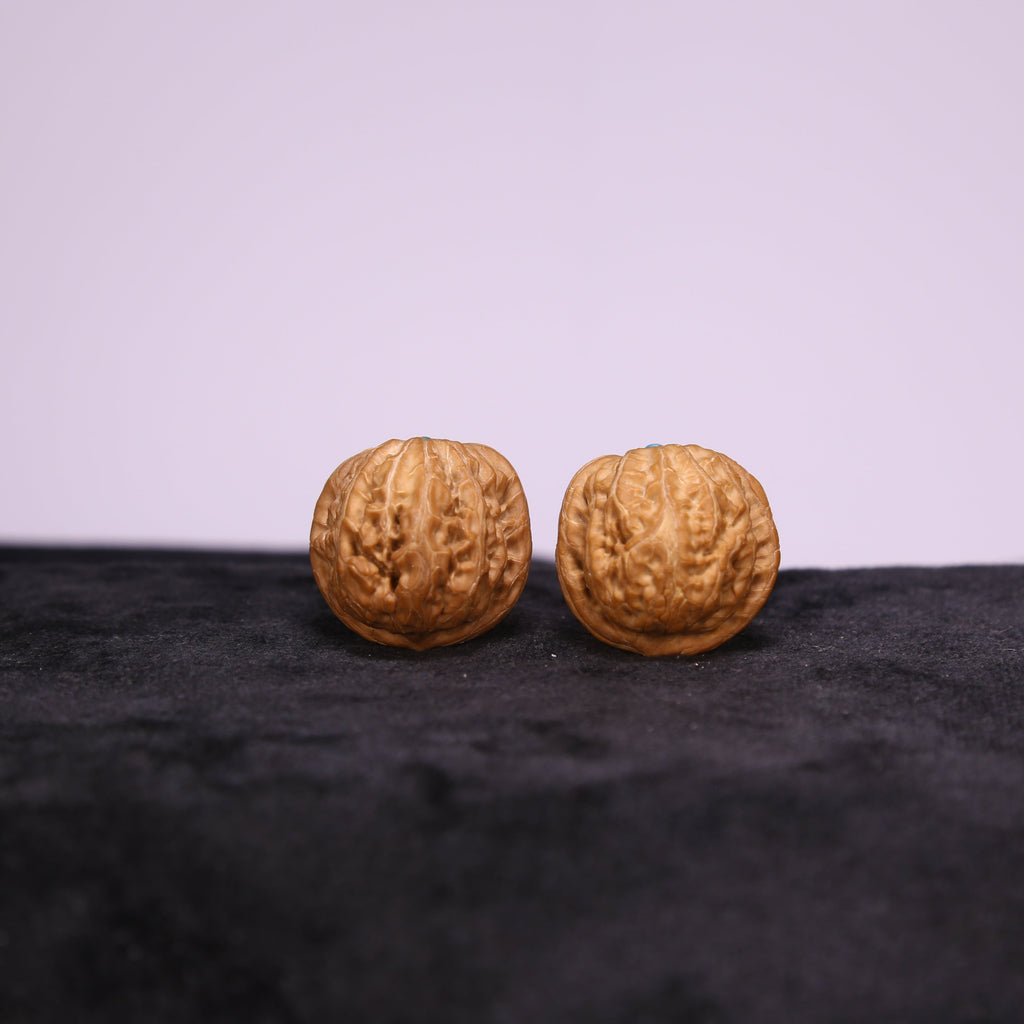 The Sculpted Vaults | Ping-Gu Yuan-Bao Walnut Set G4930