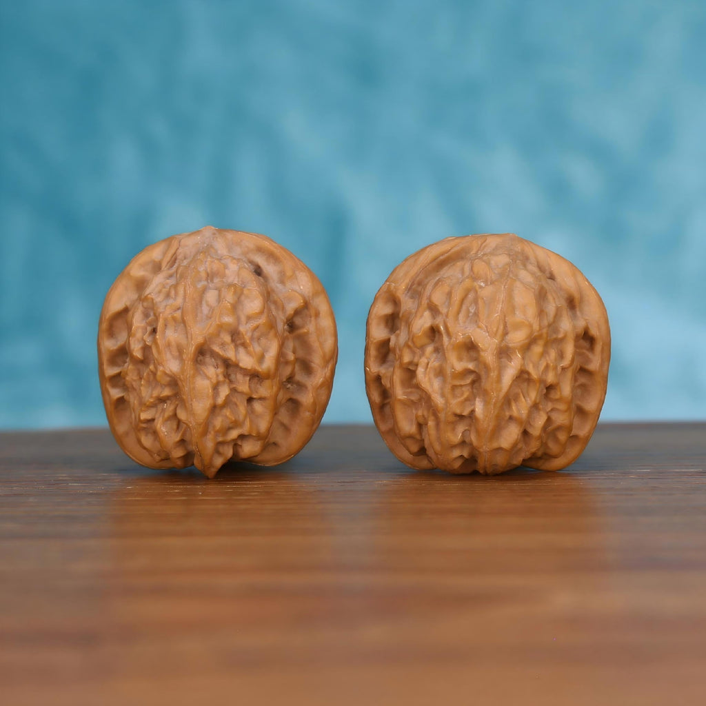 CWY12 Wu-Ming walnut pair showing deep natural ridges and 0.0g weight symmetry by mistbodhi