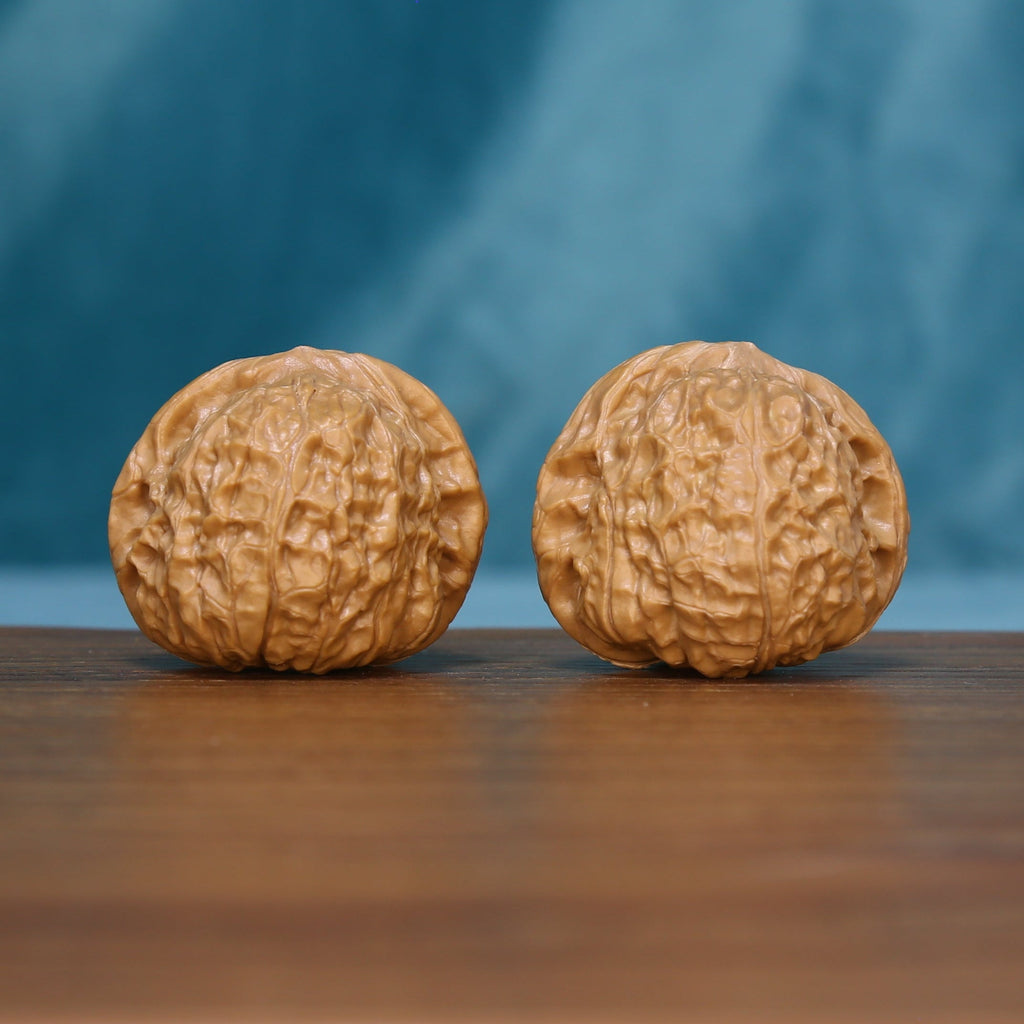 6105 Sunlit Ridge wenwan walnut pair showing their rounded profiles
