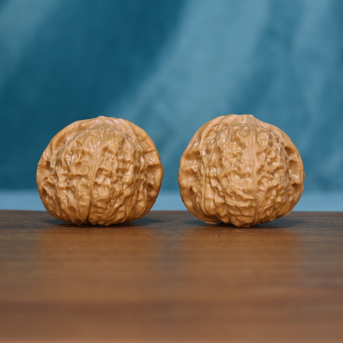6105 Sunlit Ridge wenwan walnut pair showing their rounded profiles
