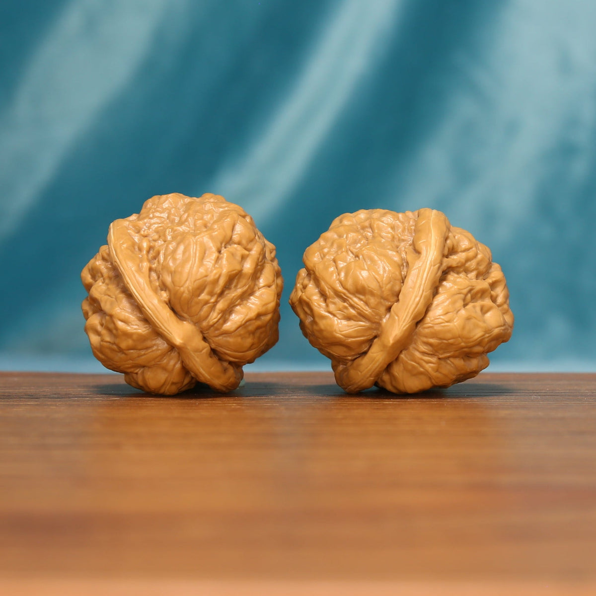 The Azure Rosette L38 wenwan walnut pair, rotated view of the ridged sides
