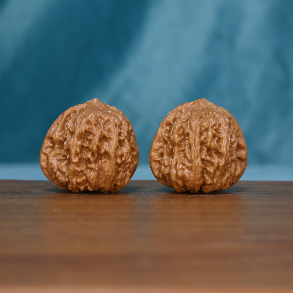 5959 wenwan walnut pair standing upright with textured tan surfaces

