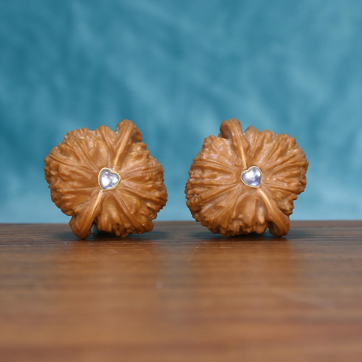 Shi-Zi-Tou walnut pair front view – deep-set rolling ridges for palm pressure point massage