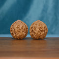 Pair of 6209 Rosette Ridge wenwan walnuts with raised winding ridges
