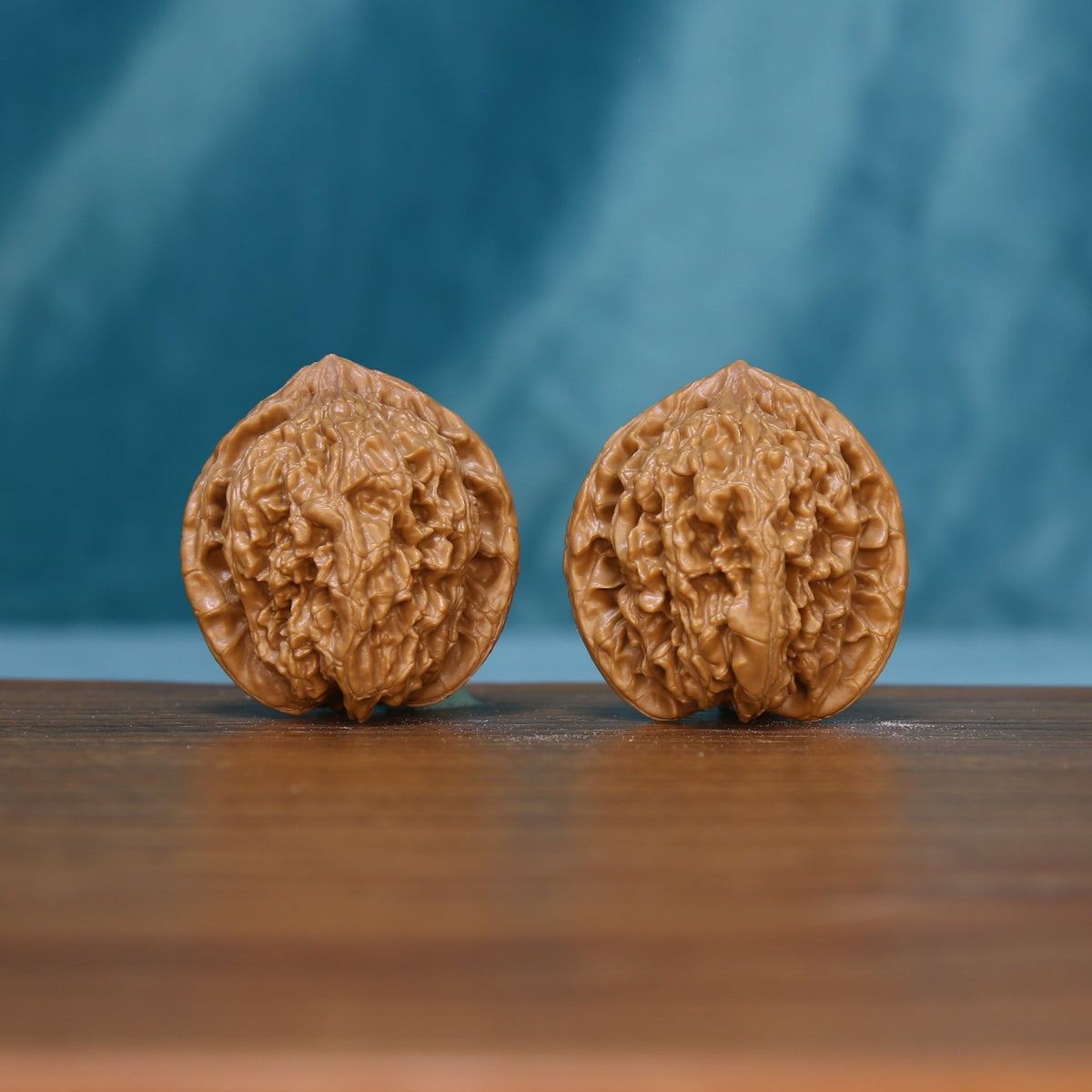 6209 Rosette Ridge wenwan walnut pair showing their textured tan surfaces
