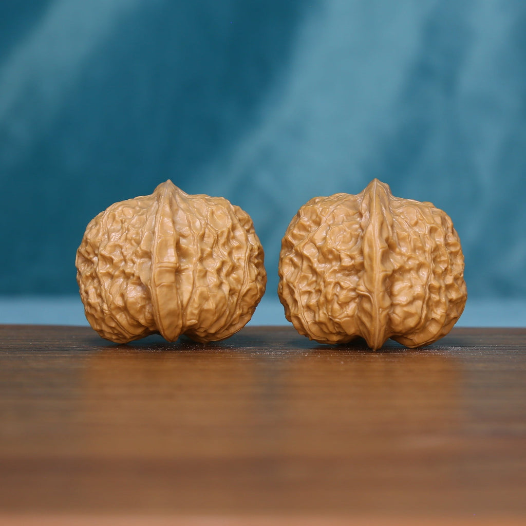 Reverse view of the 6094 wenwan walnut pair with textured surfaces
