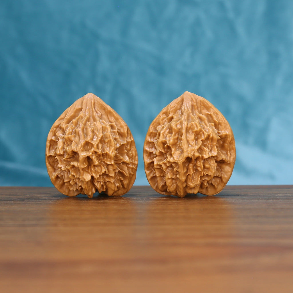 Emperor wenwan walnut pair 6130 shown side by side, front view of the matched tall silhouette
