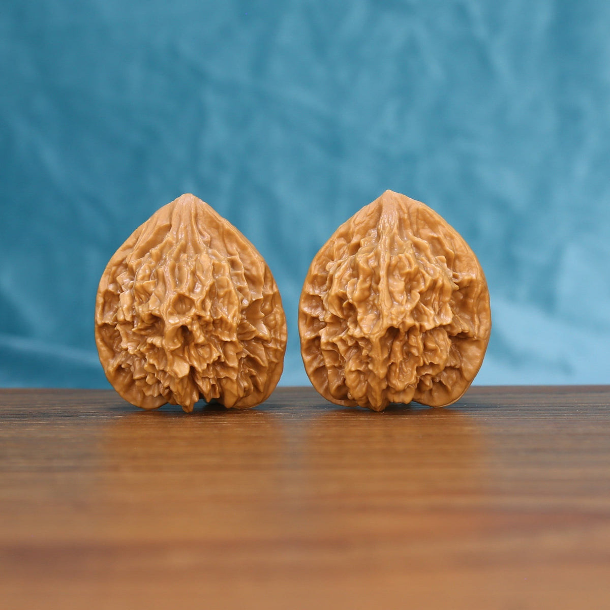 Emperor wenwan walnut pair 6130 shown side by side, front view of the matched tall silhouette

