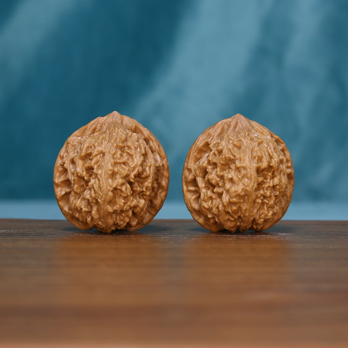 6136 Winding Crown wenwan walnut pair showing their textured brown surfaces
