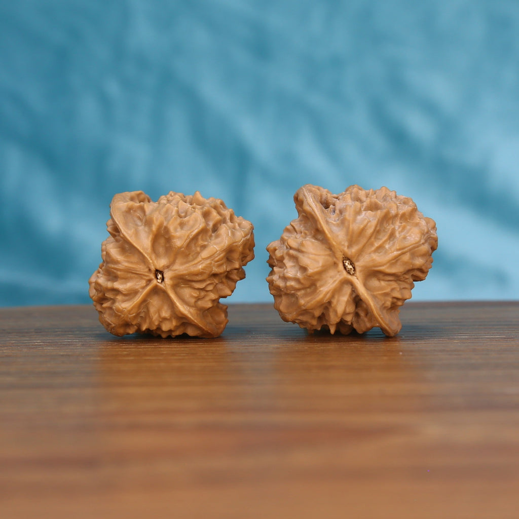 Ling-Long walnut pair bottom view on wood – natural carved labyrinth base pattern, Carved Labyrinth premium set