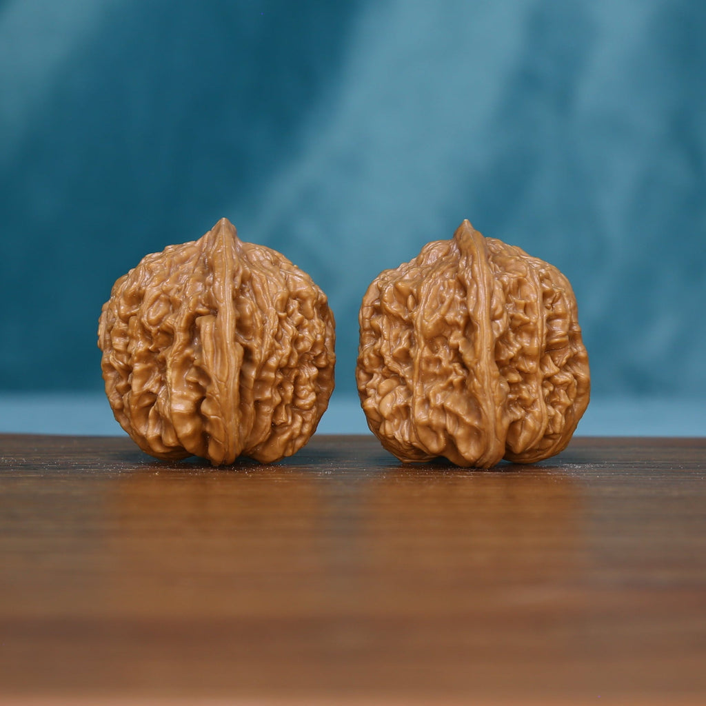 Reverse view of the 6127 wenwan walnut pair showing their natural texture
