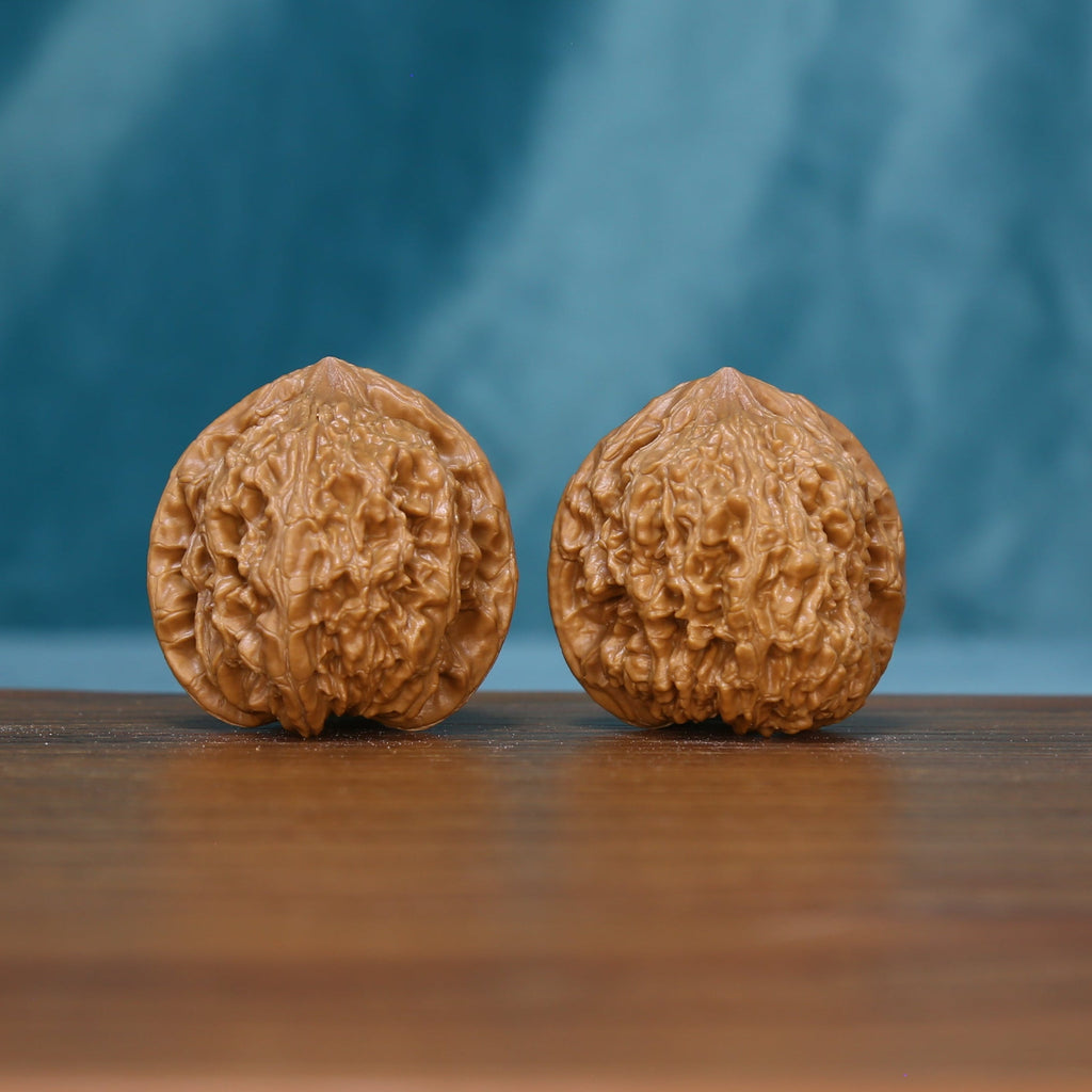 Pair of 6180 Braided Crest wenwan walnuts with closely winding ridges
