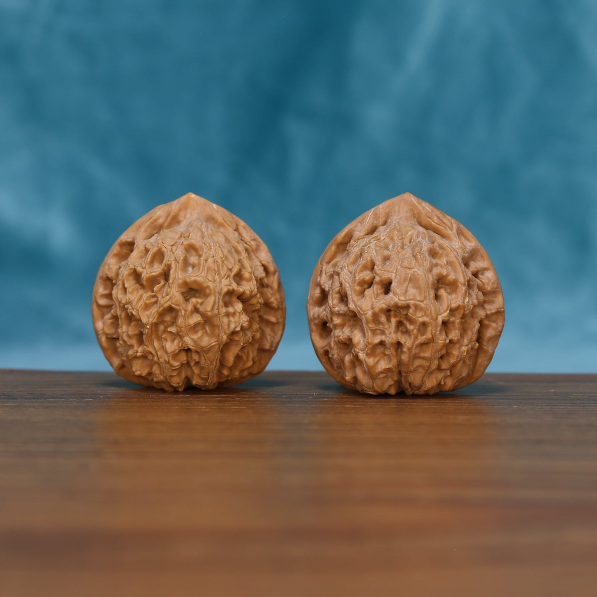 The Hearth Rounds | CWY210 Wenwan Walnut Set Matched pair of CWY210 Wenwan walnuts with rounded form and natural grain