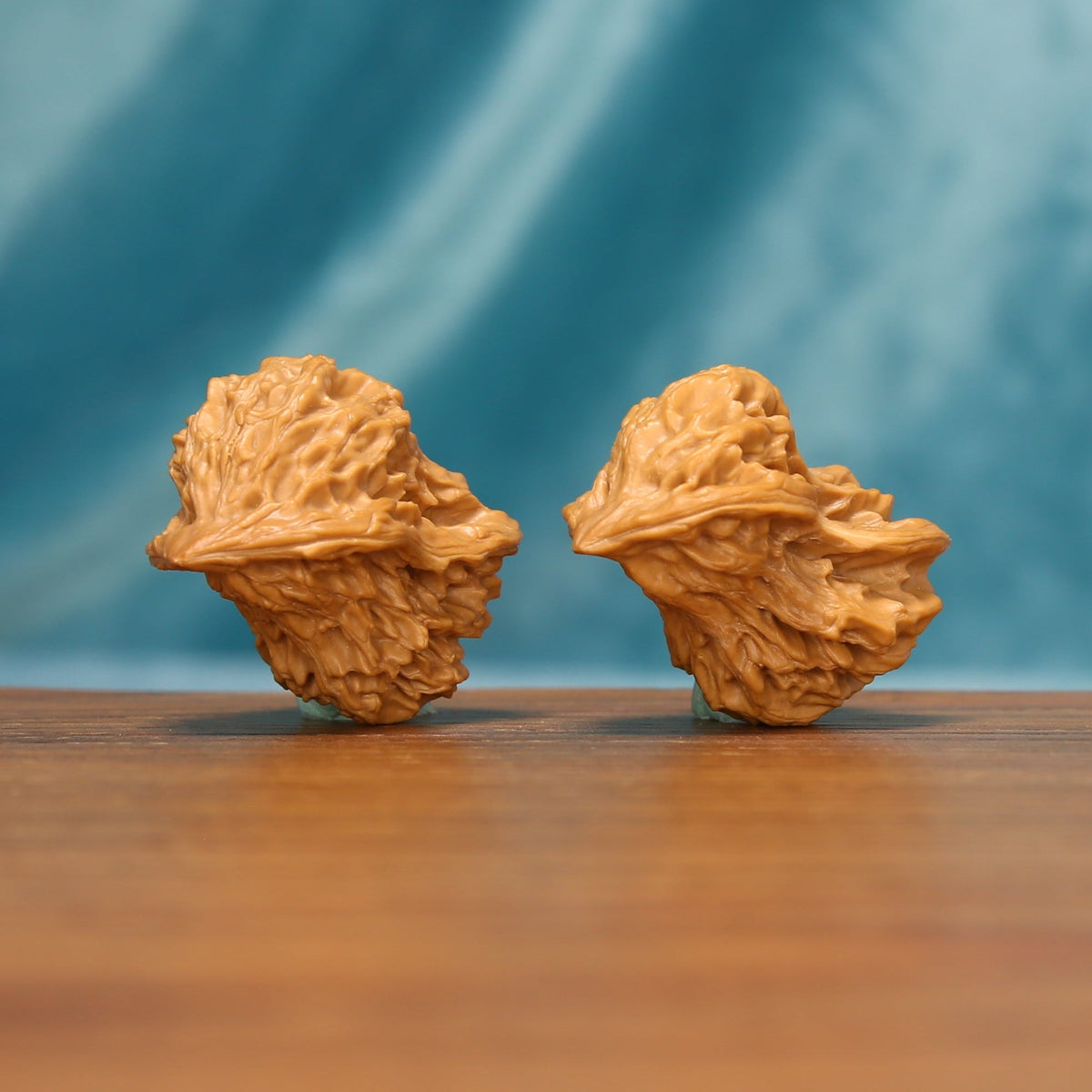The Longform Twins L36 wenwan walnuts, angled view of the sculpted ridges
