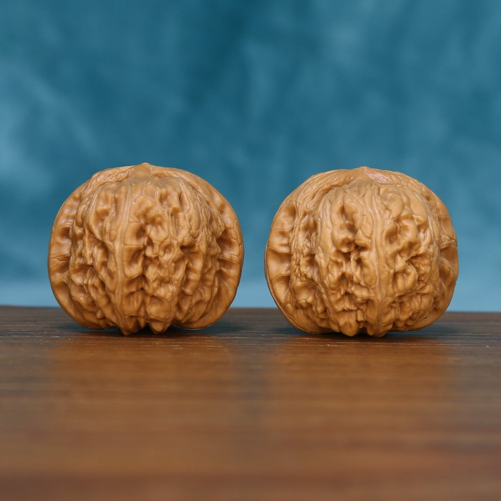 L14 Wenwan Walnut Pair – Front view showing deep, bold grain texture against blue background
