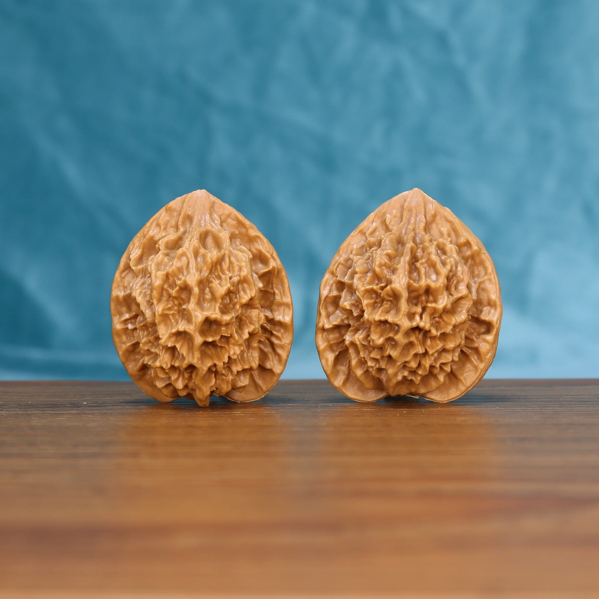 Emperor wenwan walnut pair 6144 shown side by side, front view of the matched tall form
