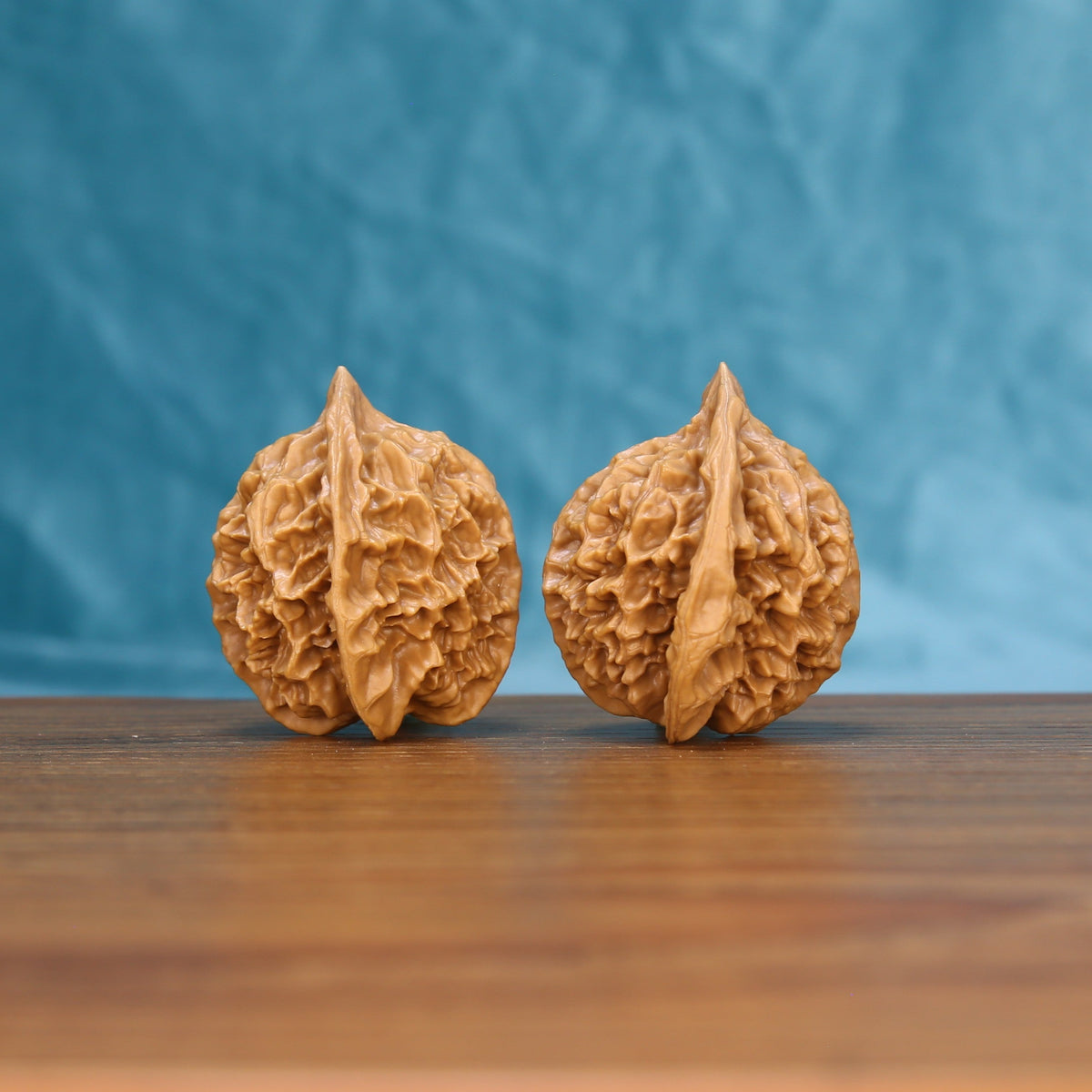 Emperor wenwan walnut set at a slight angle, highlighting the pointed crown and full body

