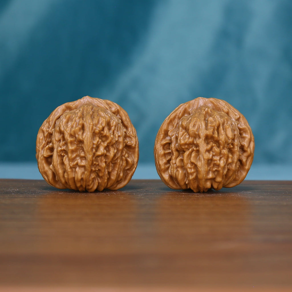6123 wenwan walnut pair standing upright with textured tan surfaces

