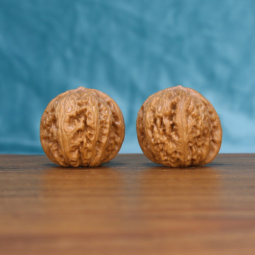 Pinggu Ingot wenwan walnut pair 6143 shown side by side, front view of the matched ingot form

