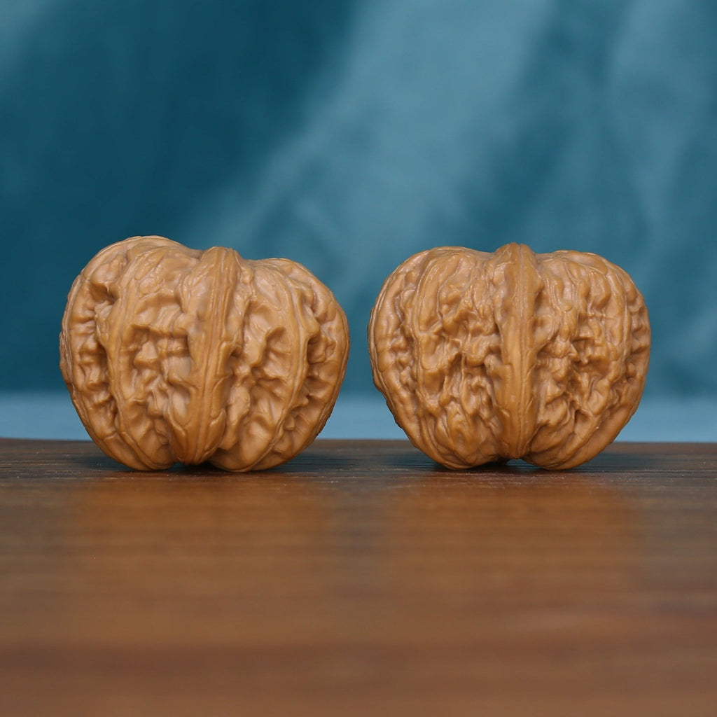 Another view of the L42 Layered Crest wenwan walnut pair showing vertical grooves
