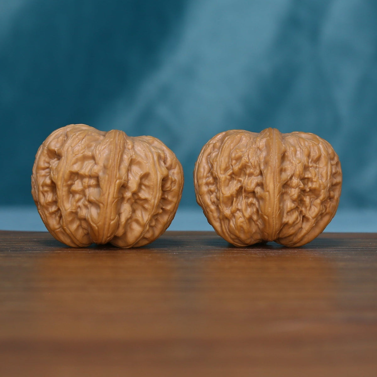 Another view of the L42 Layered Crest wenwan walnut pair showing vertical grooves
