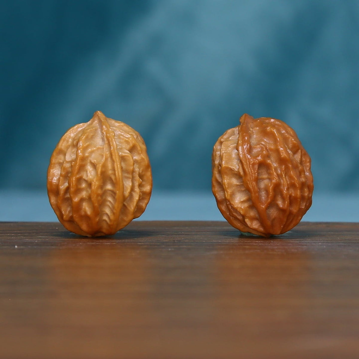 Opposite side view of the L39 Ember Crest wenwan walnut pair

