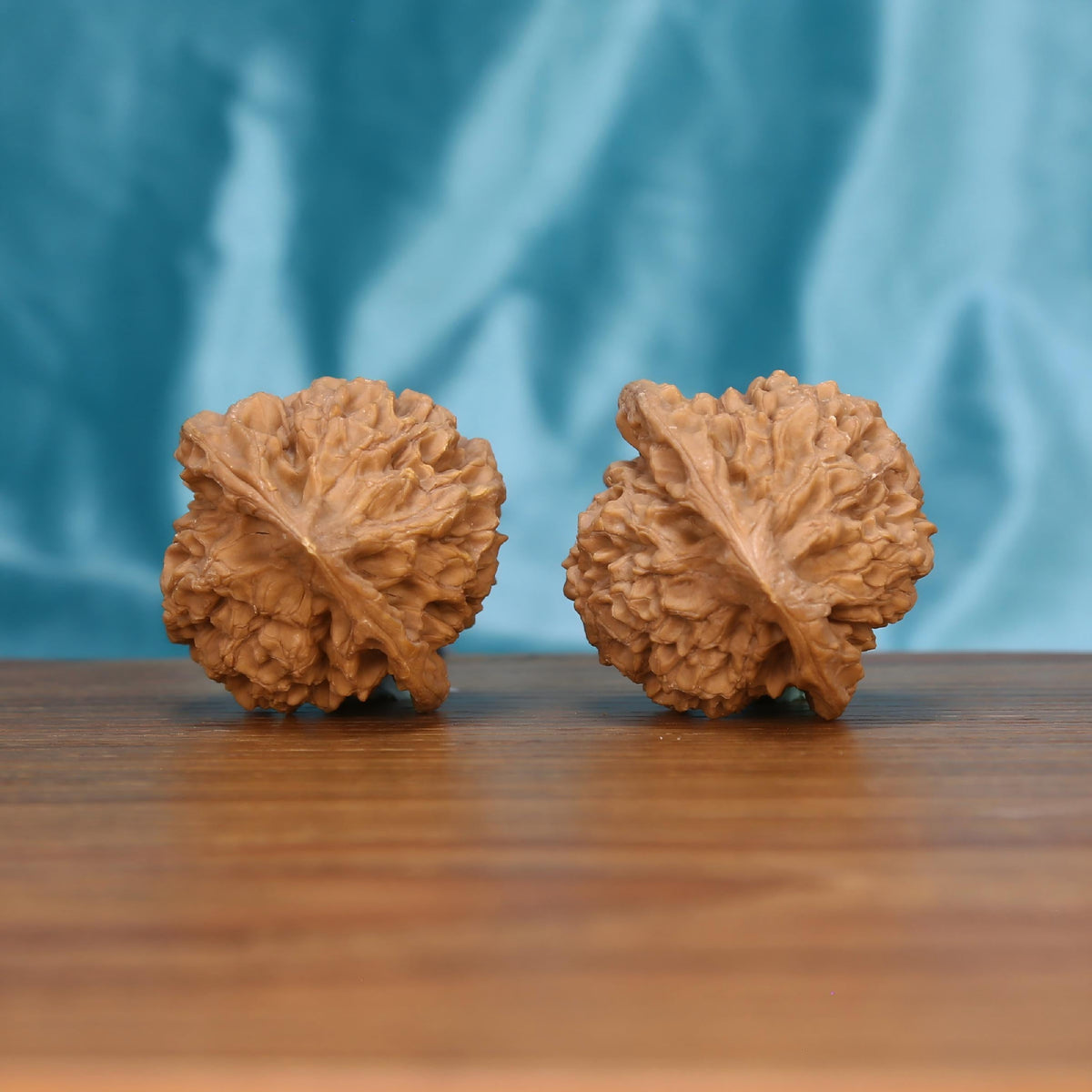 W7574 Qi-Lin-Wen walnut spheres – mythical beast scale topography and 0.6g artisanal balance