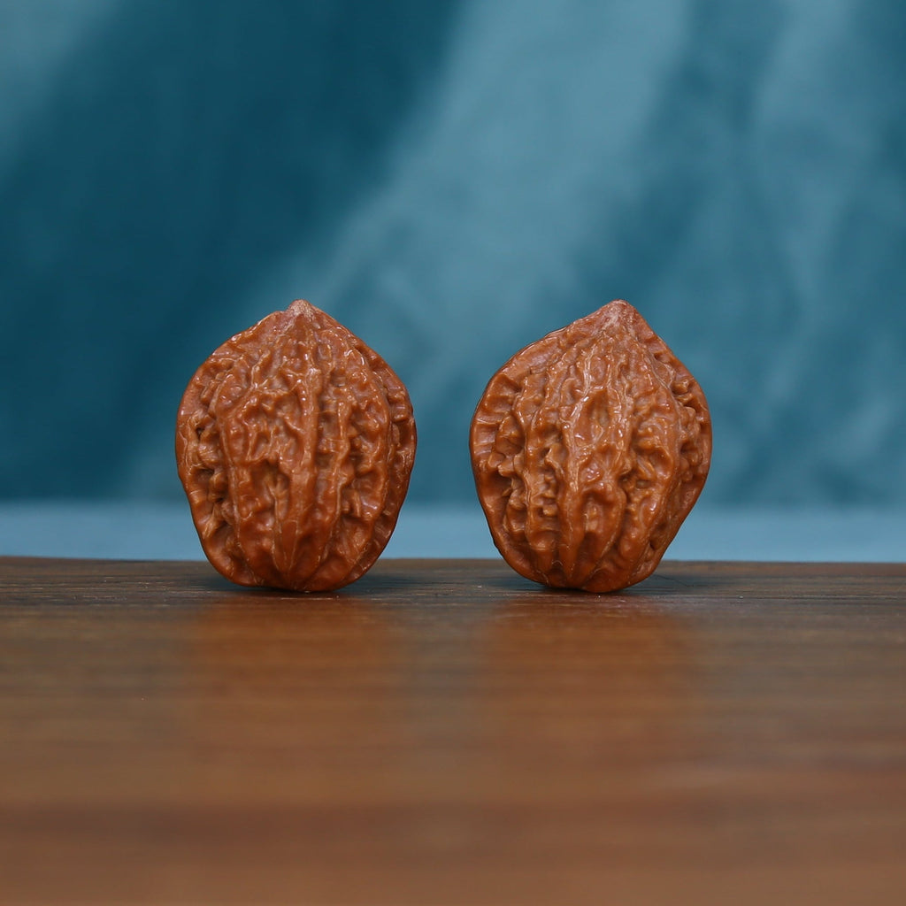 244 wenwan walnut pair showing textured reddish-brown surfaces
