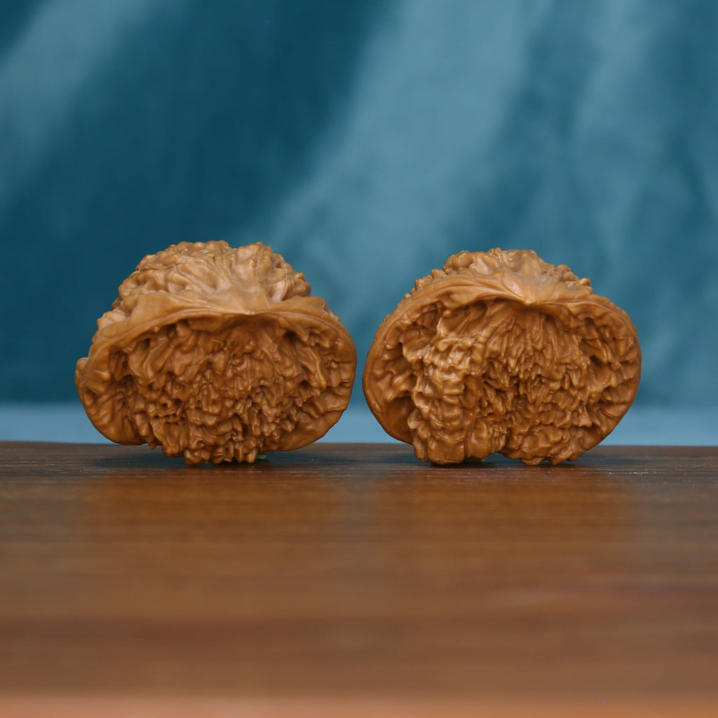 Side view of the 1715 wenwan walnut pair with layered grooves
