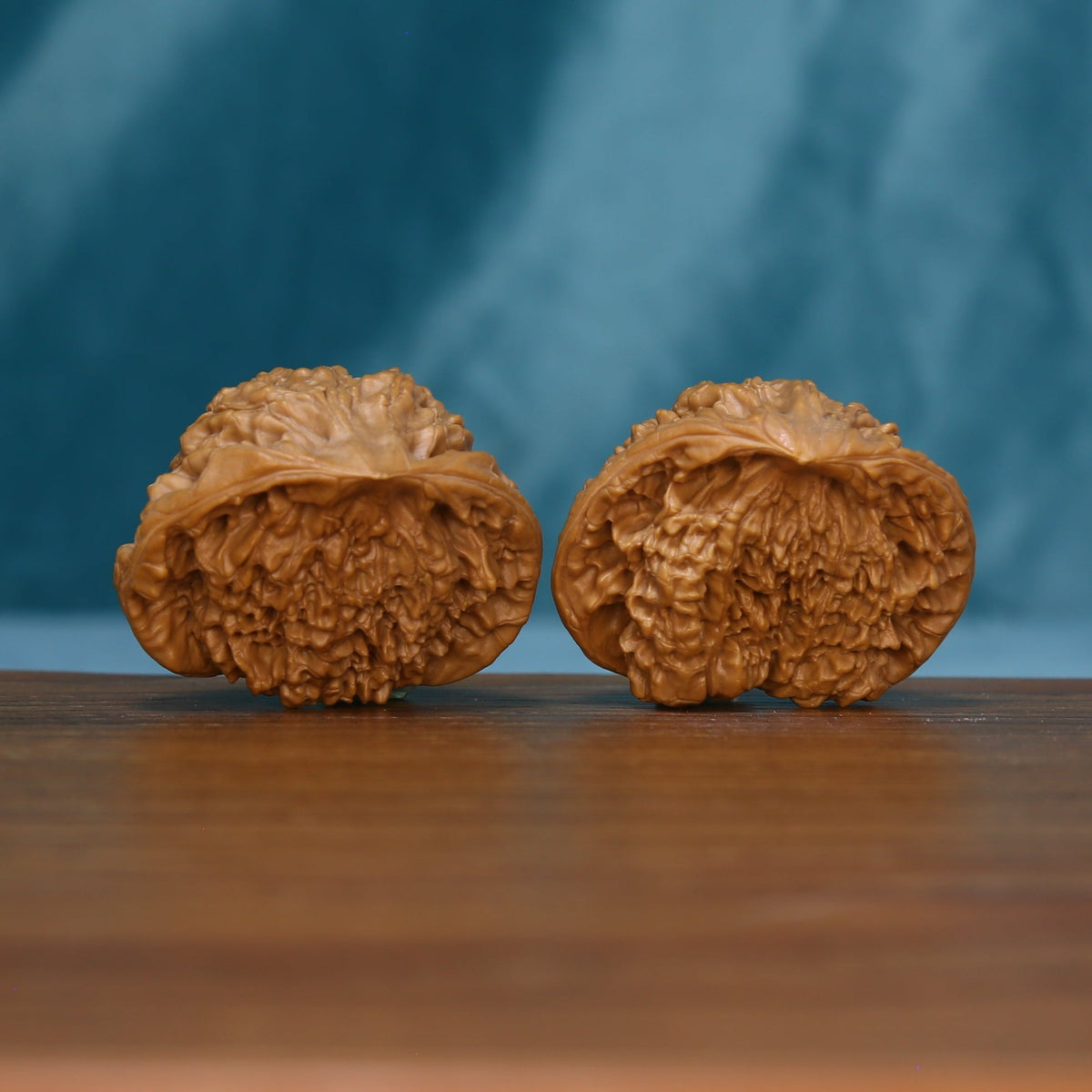 Side view of the 1715 wenwan walnut pair with layered grooves
