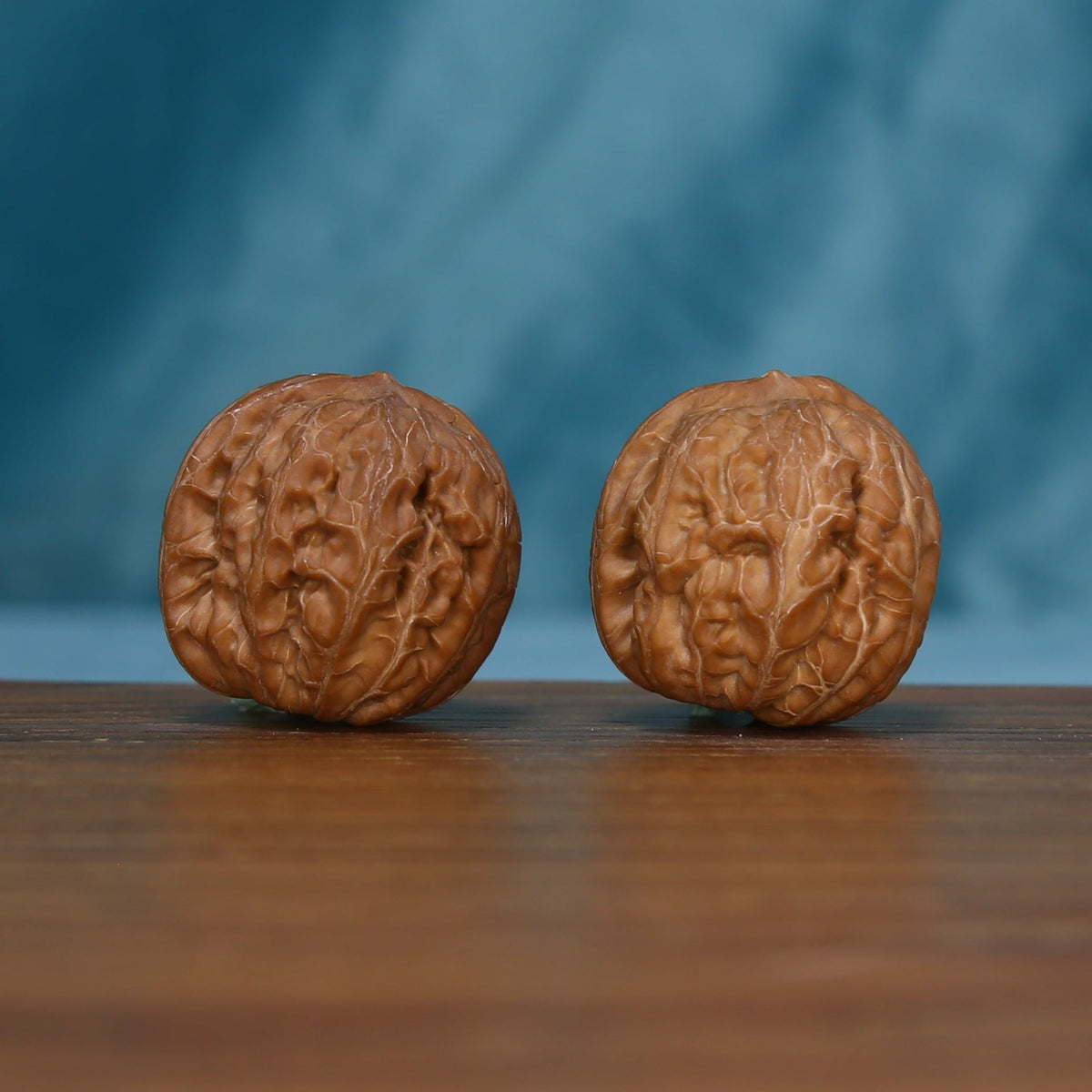 Opposite side of the Pinggu Yuanbao wenwan walnut pair, SKU 4930
