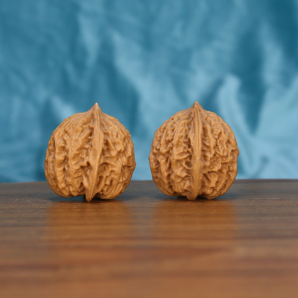  Xiao-Jin-Niu wenwan walnut pair alternate angle, blue background – symmetrical untamed ridge pattern