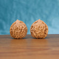 Deng-Long walnut pair front view – deeply carved labyrinth ridges and 34mm compact EDC spheres
