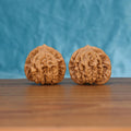  Two Mai-Sui-Hu-Tou wenwan walnuts on wooden surface, blue fabric background – matching primal crest set