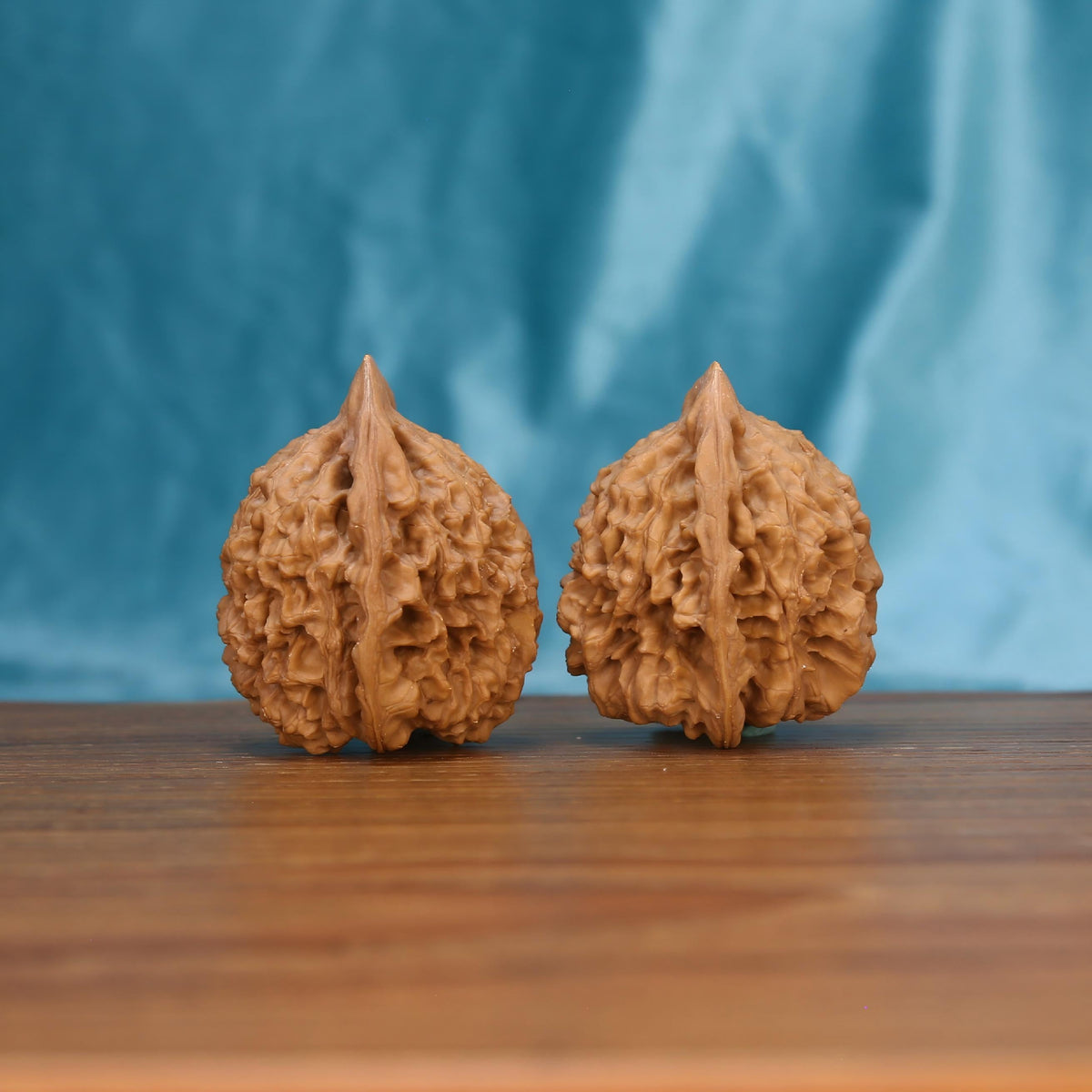 W7563 Sovereign Crown walnut close-up – intricate kylin topography and pressure point massage texture
